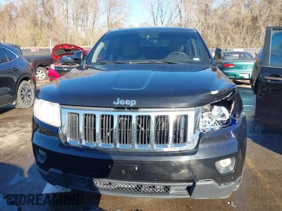 2011 Jeep Grand Cherokee 70th Anniversary z VIN 1J4RR4GT8BC504618, wystawiony jako IAAI lot #40993960 z przebiegiem 188 098 mil mil oraz . Historia ofert i sprzedaży dostępna na DreamBid. Obrazek 12.