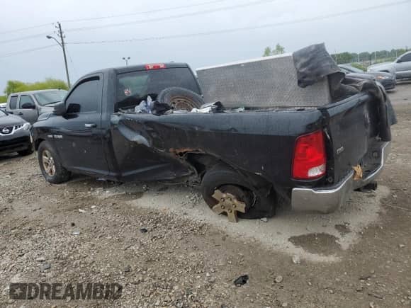 2009 Dodge 1500 SLT with VIN 1D3HB16T79J529562, listed as a Copart auction lot 77783804 with 235,289 mi miles and Salvage title. Bid and sale history available at DreamBid. Image 2.