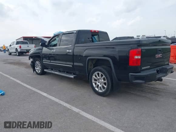 2015 GMC Sierra 1500 Denali with VIN 3GTU2WEC4FG329421, listed as a IAAI auction lot 42275605 with 102,820 mi miles and . Bid and sale history available at DreamBid. Image 3.