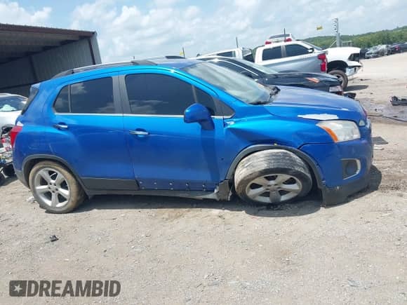 2015 Chevrolet Trax LTZ with VIN KL7CJNSB9FB056874, listed as a IAAI auction lot 42744436 with 135,418 mi miles and . Bid and sale history available at DreamBid. Image 13.