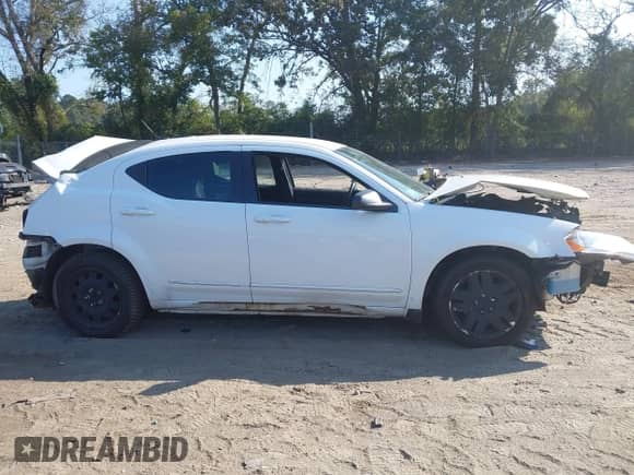 2012 Dodge Avenger SE with VIN 1C3CDZAG7CN327802, listed as a IAAI auction lot 43276853 with 88,919 mi miles and . Bid and sale history available at DreamBid. Image 14.