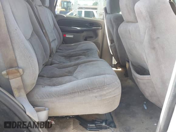 2003 Chevrolet Tahoe LT z VIN 1GNEC13Z03R318933, wystawiony jako IAAI lot #41828148 z przebiegiem 192 851 mil mil oraz . Historia ofert i sprzedaży dostępna na DreamBid. Obrazek 8.