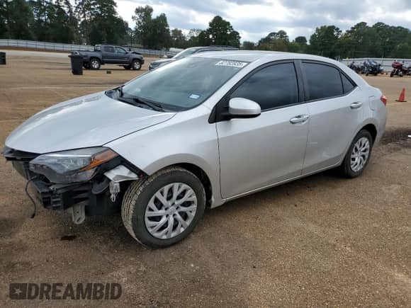 2019 Toyota Corolla LE с VIN 5YFBURHE9KP885213, выставлен на аукционе Copart как лот 82782835 с пробегом 96 185 миль миль и Списание • Salvage title. История ставок и продаж доступна на DreamBid. Изображение 1.