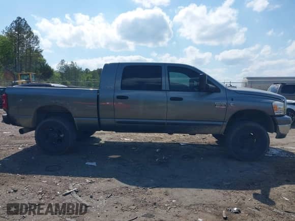 2007 Dodge 2500 Laramie z VIN 3D7KS29C57G709790, wystawiony jako IAAI lot #42055060 z przebiegiem 218 369 mil mil oraz . Historia ofert i sprzedaży dostępna na DreamBid. Obrazek 13.