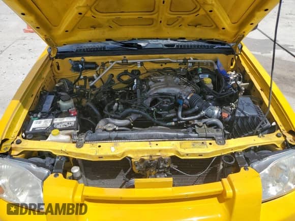 2004 Nissan Frontier XE с VIN 1N6ED29X34C434680, выставлен на аукционе Copart как лот 65938125 с пробегом 229 530 миль миль и Списание • Salvage title. История ставок и продаж доступна на DreamBid. Изображение 11.