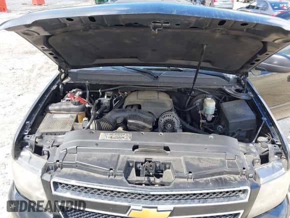 2010 Chevrolet Suburban LT z VIN 1GNUCJE08AR192831, wystawiony jako IAAI lot #42534754 z przebiegiem 165 741 mil mil oraz . Historia ofert i sprzedaży dostępna na DreamBid. Obrazek 10.