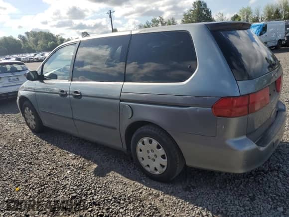 2001 Honda Odyssey LX с VIN 2HKRL18531H540774, выставлен на аукционе Copart как лот 57670255 с пробегом 209 379 миль миль и Списание • Salvage title. История ставок и продаж доступна на DreamBid. Изображение 2.