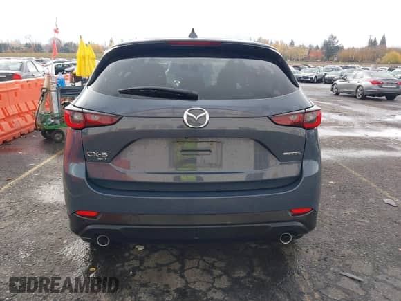 2023 Mazda CX-5 S Carbon Edition z VIN JM3KFBCM2P0212062, wystawiony jako IAAI lot #40853928 z przebiegiem 25 463 mil mil oraz . Historia ofert i sprzedaży dostępna na DreamBid. Obrazek 16.