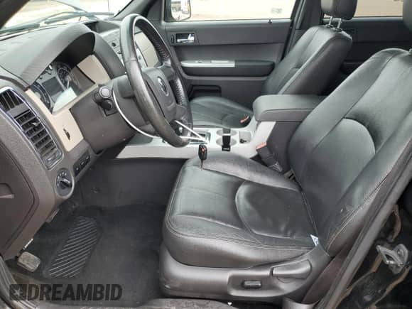 2008 Mercury Mariner Premier with VIN 4M2CU97188KJ32728, listed as a Copart auction lot 70736905 with 217,659 mi miles and Salvage title. Bid and sale history available at DreamBid. Image 7.