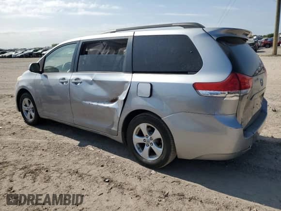 2012 Toyota Sienna LE with VIN 5TDKK3DC1CS276911, listed as a Copart auction lot 89585945 with 209,475 mi miles and Clean title. Bid and sale history available at DreamBid. Image 2.