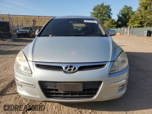 2009 Hyundai Elantra Touring with VIN KMHDC86E09U038792, listed as a Copart auction lot 84791125 with 172,061 mi miles and Salvage title. Bid and sale history available at DreamBid. Image 5.