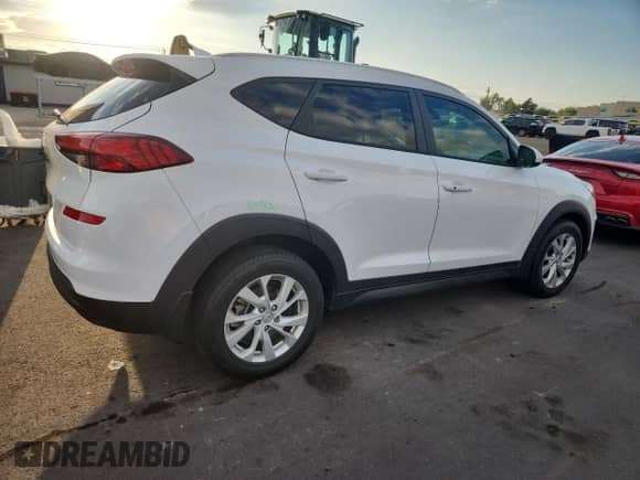 2019 Hyundai Tucson Value с VIN KM8J33A46KU851063, выставлен на аукционе Copart как лот 81878865 с пробегом 73 860 миль миль и Списание • Salvage title. История ставок и продаж доступна на DreamBid. Изображение 3.