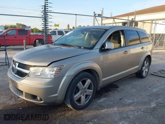 2009 Dodge Journey SXT with VIN 3D4GH57V69T607688, listed as a IAAI auction lot 43348638 with 192,901 mi miles and . Bid and sale history available at DreamBid. Image 2.