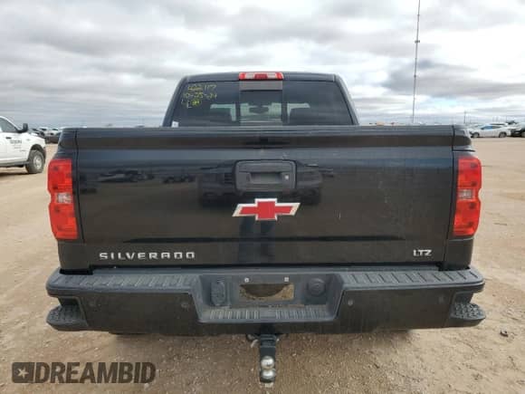 2015 Chevrolet Silverado 1500 LTZ z VIN 3GCUKSEJ4FG527584, wystawiony jako Copart lot #80004154 z przebiegiem 172 767 mil mil oraz Szkoda całkowita • Salvage title. Historia ofert i sprzedaży dostępna na DreamBid. Obrazek 6.