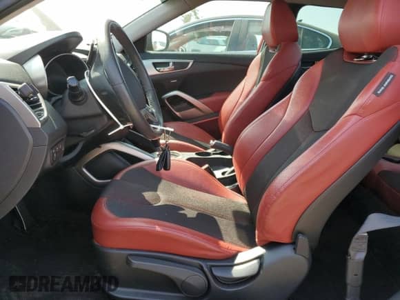 2012 Hyundai Veloster w/Red Int с VIN KMHTC6AD4CU054208, выставлен на аукционе Copart как лот 62169895 с пробегом 61 088 миль миль и Списание • Salvage title. История ставок и продаж доступна на DreamBid. Изображение 7.