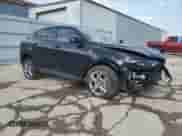 2024 Dodge Hornet R/T with VIN ZACPDFCW4R3A32325, listed as a Copart auction lot 57558995 with 19,298 mi miles and Salvage title. Bid and sale history available at DreamBid. Image 4.