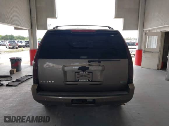 2012 Chevrolet Tahoe LT with VIN 1GNSCBE05CR132201, listed as a IAAI auction lot 42671016 with 219,625 mi miles and . Bid and sale history available at DreamBid. Image 16.