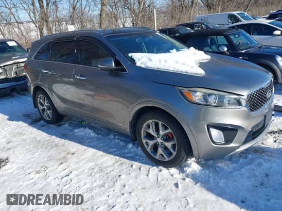 2016 Kia Sorento SXL z VIN 5XYPKDA58GG080887, wystawiony jako IAAI lot #41315725 z przebiegiem 140 831 mil mil oraz . Historia ofert i sprzedaży dostępna na DreamBid. Obrazek 1.