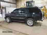 2009 Cadillac Escalade with VIN 1GYFK23249R197075, listed as a Copart auction lot 62199165 with 237,734 mi miles and Salvage title. Bid and sale history available at DreamBid. Image 2.