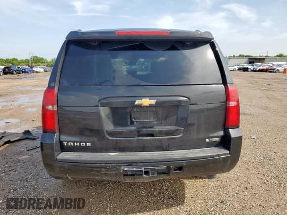 2017 Chevrolet Tahoe Premier with VIN 1GNSCCKC3HR219574, listed as a Copart auction lot 61045345 with 124,927 mi miles and Salvage title. Bid and sale history available at DreamBid. Image 6.