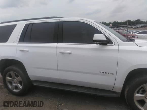 2019 Chevrolet Tahoe LT with VIN 1GNSCBKC2KR196841, listed as a IAAI auction lot 42411291 with 82,023 mi miles and . Bid and sale history available at DreamBid. Image 13.