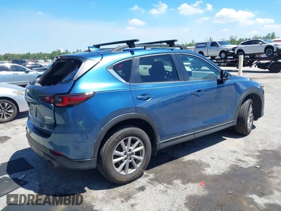 2022 Mazda CX-5 S Carbon Edition с VIN JM3KFBCM5N0620116, выставлен на аукционе IAAI как лот 43033082 с пробегом 48 059 миль миль и . История ставок и продаж доступна на DreamBid. Изображение 4.