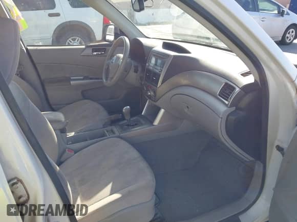 2009 Subaru Forester X with VIN JF2SH63619H758501, listed as a IAAI auction lot 42303581 with 207,078 mi miles and . Bid and sale history available at DreamBid. Image 5.