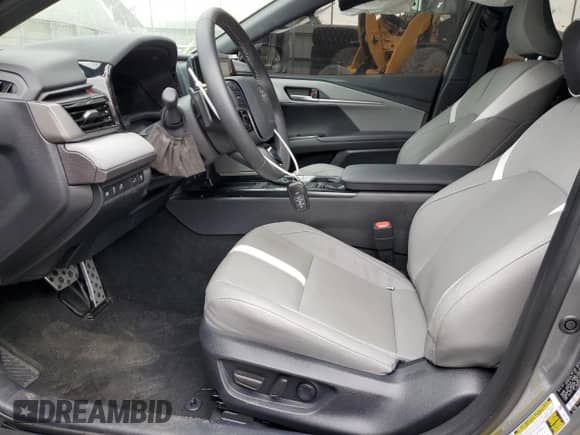 2025 Toyota Camry LE with VIN 4T1DAACKXSU620198, listed as a Copart auction lot 83829035 with 1,218 mi miles and Salvage title. Bid and sale history available at DreamBid. Image 7.