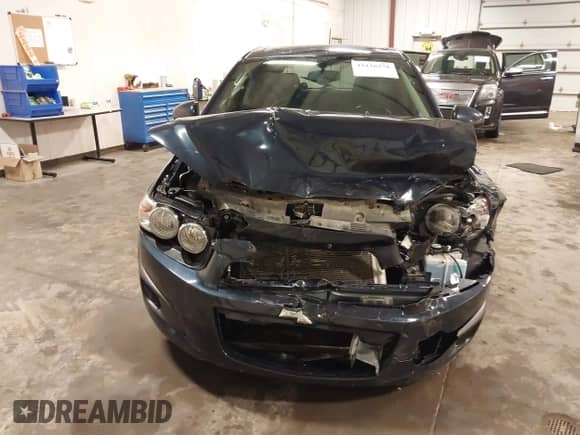 2015 Chevrolet Sonic LS with VIN 1G1JA6SH4F4160285, listed as a IAAI auction lot 42436278 with 94,122 mi miles and . Bid and sale history available at DreamBid. Image 13.