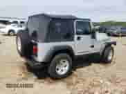 2004 Jeep Wrangler Rubicon with VIN 1J4FA69S24P769671, listed as a Copart auction lot 67028605 with 142,794 mi miles and Salvage title. Bid and sale history available at DreamBid. Image 3.