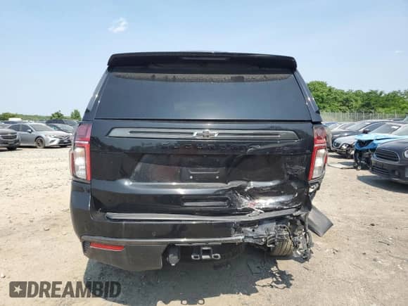 2022 Chevrolet Suburban RST с VIN 1GNSCEKD0NR307918, выставлен на аукционе Copart как лот 56727495 с пробегом 98 358 миль миль и Списание • Salvage title. История ставок и продаж доступна на DreamBid. Изображение 6.
