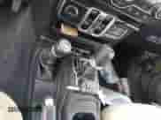 2023 Jeep Wrangler Willys Sport z VIN 1C4HJXDM0PW515898, wystawiony jako IAAI lot #41419267 z przebiegiem 10 964 mil mil oraz . Historia ofert i sprzedaży dostępna na DreamBid. Obrazek 11.