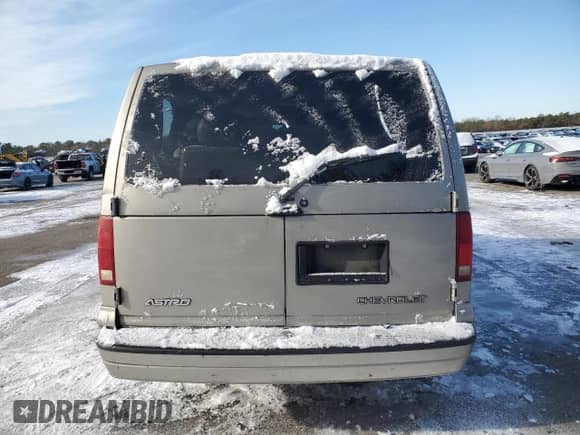 2005 Chevrolet Astro z VIN 1GNDM19X55B128751, wystawiony jako Copart lot #88860595 z przebiegiem Nie podano mil oraz Szkoda całkowita • Salvage title. Historia ofert i sprzedaży dostępna na DreamBid. Obrazek 6.