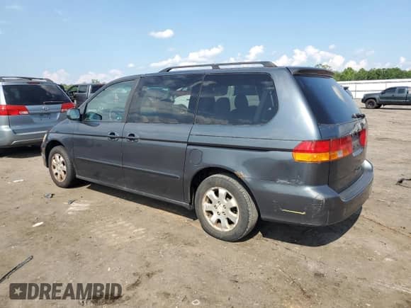 2004 Honda Odyssey EX с VIN 5FNRL18694B086512, выставлен на аукционе Copart как лот 64595775 с пробегом 175 144 миль миль и Списание • Salvage title. История ставок и продаж доступна на DreamBid. Изображение 2.