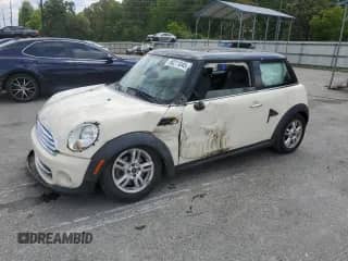 2012 MINI Hardtop with VIN WMWSU3C52CT257621, listed as a Copart auction lot 56211045 with 100,262 mi miles and Salvage title. Bid and sale history available at DreamBid. Image 1.