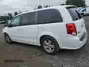 2013 Dodge Grand Caravan SE with VIN 2C4RDGBG2DR813544, listed as a Copart auction lot 69126495 with 116,344 mi miles and Salvage title. Bid and sale history available at DreamBid. Image 2.