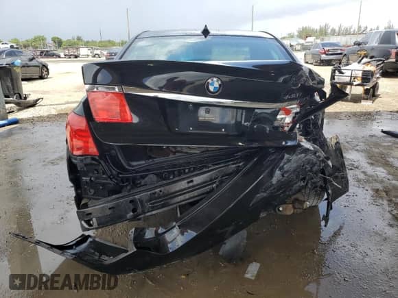 2011 BMW 7 Series 740i с VIN WBAKA4C55BC612973, выставлен на аукционе Copart как лот 66282185 с пробегом 106 117 миль миль и Списание • Salvage title. История ставок и продаж доступна на DreamBid. Изображение 6.