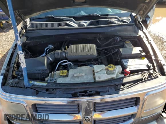 2007 Dodge Nitro SXT с VIN 1D8GU28K17W656995, выставлен на аукционе Copart как лот 81774955 с пробегом 218 133 миль миль и Списание • Salvage title. История ставок и продаж доступна на DreamBid. Изображение 12.