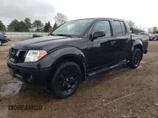 2021 Nissan Frontier Pro-4X with VIN 1N6ED0EB1MN720823, listed as a Copart auction lot 54444615 with 28,764 mi miles and Salvage title. Bid and sale history available at DreamBid. Image 1.