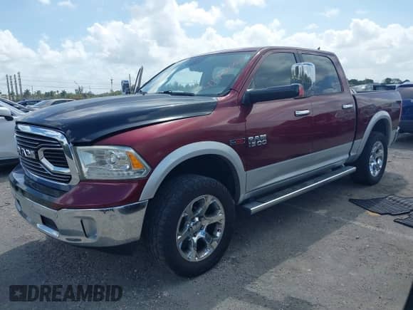 2017 Ram 1500 Laramie z VIN 1C6RR7NM8HS882107, wystawiony jako IAAI lot #41941603 z przebiegiem 99 926 mil mil oraz . Historia ofert i sprzedaży dostępna na DreamBid. Obrazek 2.