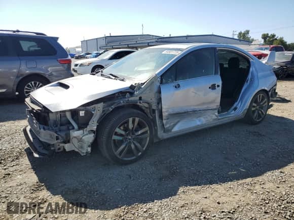 2016 Subaru WRX Premium with VIN JF1VA1E6XG9803173, listed as a Copart auction lot 64681725 with 186,608 mi miles and Salvage title. Bid and sale history available at DreamBid. Image 1.