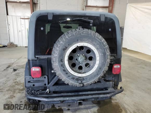 2003 Jeep Wrangler Rubicon с VIN 1J4FA69S13P360267, выставлен на аукционе Copart как лот 62077835 с пробегом 88 278 миль миль и Чистый • Clean title. История ставок и продаж доступна на DreamBid. Изображение 6.