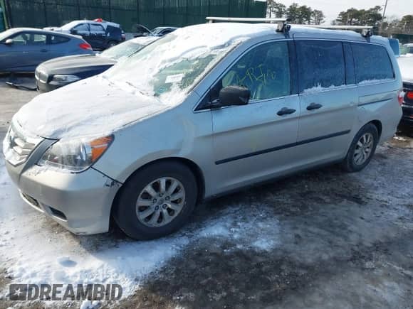 2009 Honda Odyssey LX z VIN 5FNRL38299B059391, wystawiony jako IAAI lot #41399797 z przebiegiem 9 999 999 mil mil oraz . Historia ofert i sprzedaży dostępna na DreamBid. Obrazek 2.