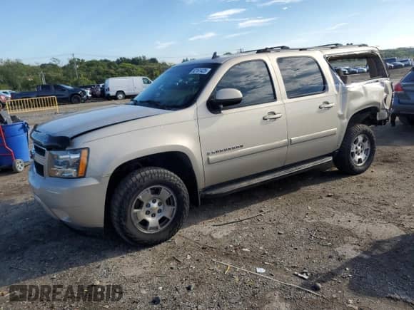 2007 Chevrolet Suburban LT with VIN 1GNFK163X7J224481, listed as a Copart auction lot 82161425 with 126,691 mi miles and Salvage title. Bid and sale history available at DreamBid. Image 1.