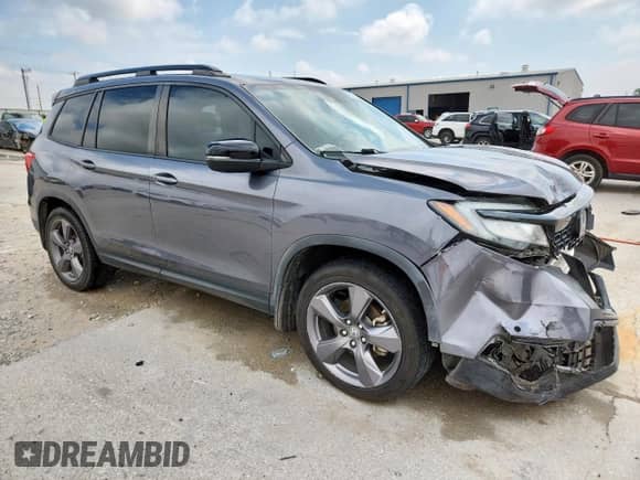 2020 Honda Passport Touring с VIN 5FNYF7H94LB003860, выставлен на аукционе Copart как лот 58833295 с пробегом 124 855 миль миль и Списание • Salvage title. История ставок и продаж доступна на DreamBid. Изображение 4.