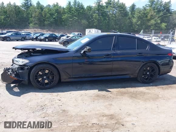 2021 BMW 5 Series 540i xDrive with VIN WBA73BJ0XMWX05467, listed as a IAAI auction lot 42543462 with 73,968 mi miles and . Bid and sale history available at DreamBid. Image 14.