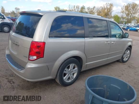 2012 Dodge Grand Caravan Crew with VIN 2C4RDGDG0CR359757, listed as a IAAI auction lot 43485394 with 84,105 mi miles and . Bid and sale history available at DreamBid. Image 4.