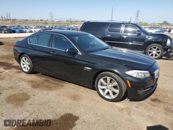 2012 BMW 5 Series 550i xDrive with VIN WBAFU9C5XCC787517, listed as a Copart auction lot 64578065 with 106,354 mi miles and Clean title. Bid and sale history available at DreamBid. Image 4.
