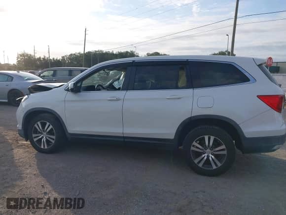 2016 Honda Pilot EX z VIN 5FNYF5H37GB038415, wystawiony jako IAAI lot #43113213 z przebiegiem 168 977 mil mil oraz . Historia ofert i sprzedaży dostępna na DreamBid. Obrazek 13.