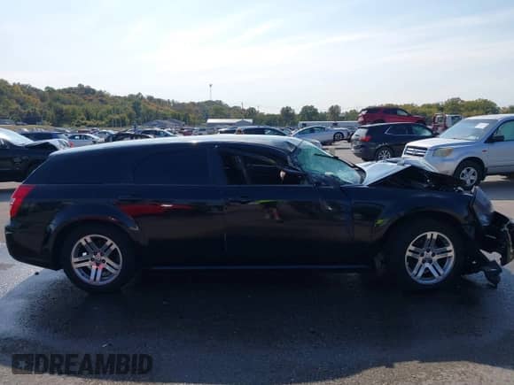 2005 Dodge Magnum SE with VIN 2D8FV48T05H516283, listed as a IAAI auction lot 40663902 with 177,973 mi miles and . Bid and sale history available at DreamBid. Image 14.